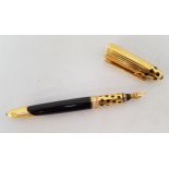 PANTHERE DE CARTIER GOLD PLATED AND ENAMEL FOUNTAIN PEN dated 1990 and numbered 051882, with