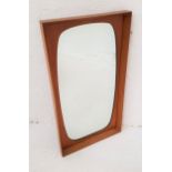 RETRO RECTANGULAR TEAK WALL MIRROR with a shaped plate, 73cm high