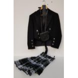 GENTLEMAN'S FULL HIGHLAND DRESS comprising a Gordon dress modern kilt, Prince Charlie black