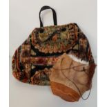 LADYIES CARPET BAG HAND BAG with leather handle and internal pocket, together with a drawstring