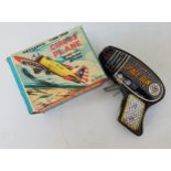 YONE OF JAPAN TINPLATE CIRCUS PLANE with a clockwork mechanism and original box, together with a
