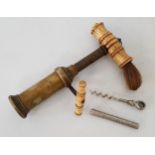 19th CENTURY THOMASON TYPE CORKSCREW with a brass barrel and steel helix, the bone handle with brush