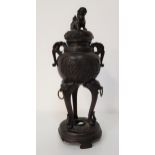 CHINESE BRONZED CENSER with dog of foe finial to the cover, the body with scroll handles and and
