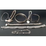 SELECTION OF EIGHT SILVER BRACELETS AND BANGLES including a triple entwined Russian wedding ring