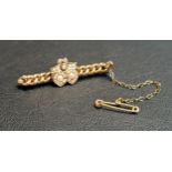 SEED PEARL SET NINE CARAT GOLD BAR BROOCH the pearls set to the central double heart and bow