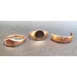 TWO SMALL NINE CARAT GOLD SIGNET RINGS one in yellow gold and the other in rose gold, both size O,