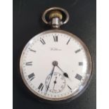 GEORGE V SILVER WALTHAM POCKET WATCH the open face with Roman numerals and a subsidiary seconds