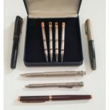 SELECTION OF PENS AND PENCILS comprising a Parker fountain pen with fourteen carat gold nib, two