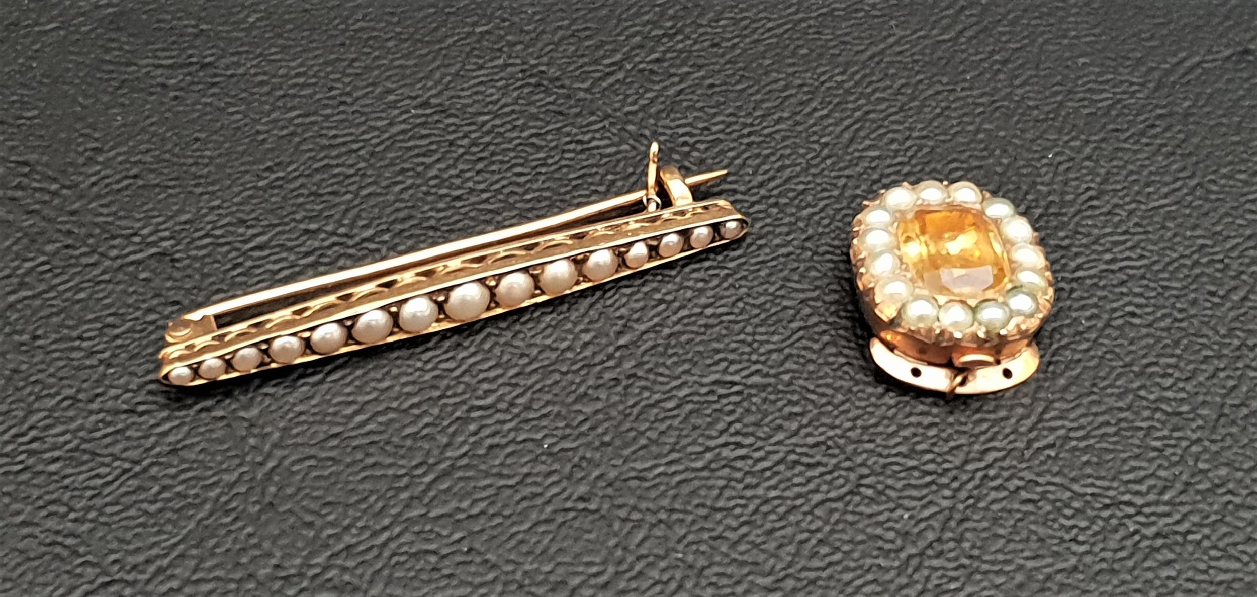 GRADUATED SEED PEARL BAR BROOCH in unmarked gold and with safety clasp, 4cm wide and approximately