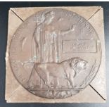 WWI BRONZE MEMORIAL PLAQUE named to George McIntosh, 12cm diameter, in a card case