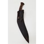 KUKRI KNIFE with a 31cm long curved blade with a teak handle with brass fixings, contained in a
