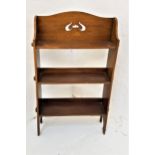 ART NOUVEAU OAK BOOKCASE with a shaped carved and pierced back above three shelves, standing on