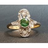 ART DECO STYLE TSAVORITE GARNET AND DIAMOND PLAQUE RING the central round cut garnet approximately