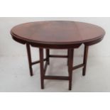 MAHOGANY DINING TABLE with shaped drop flaps and gate leg supports, 119.5cm wide