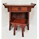 CHINESE HARDWOOD KNEEHOLE TABLE with a shaped top above a central frieze drawer, standing on