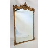 EXTREMELY LARGE CARVED GILTWOOD MIRROR the frame decorated with oak leaves, scrolls and flower