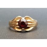 GARNET SET DRESS RING on nine carat gold shank, ring size M-N and approximately 4.6 grams