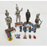SIX PEWTER SCOTTISH SOLDIERS all in Highland uniform, ranging in height from 4cm to 9.5cm; and two