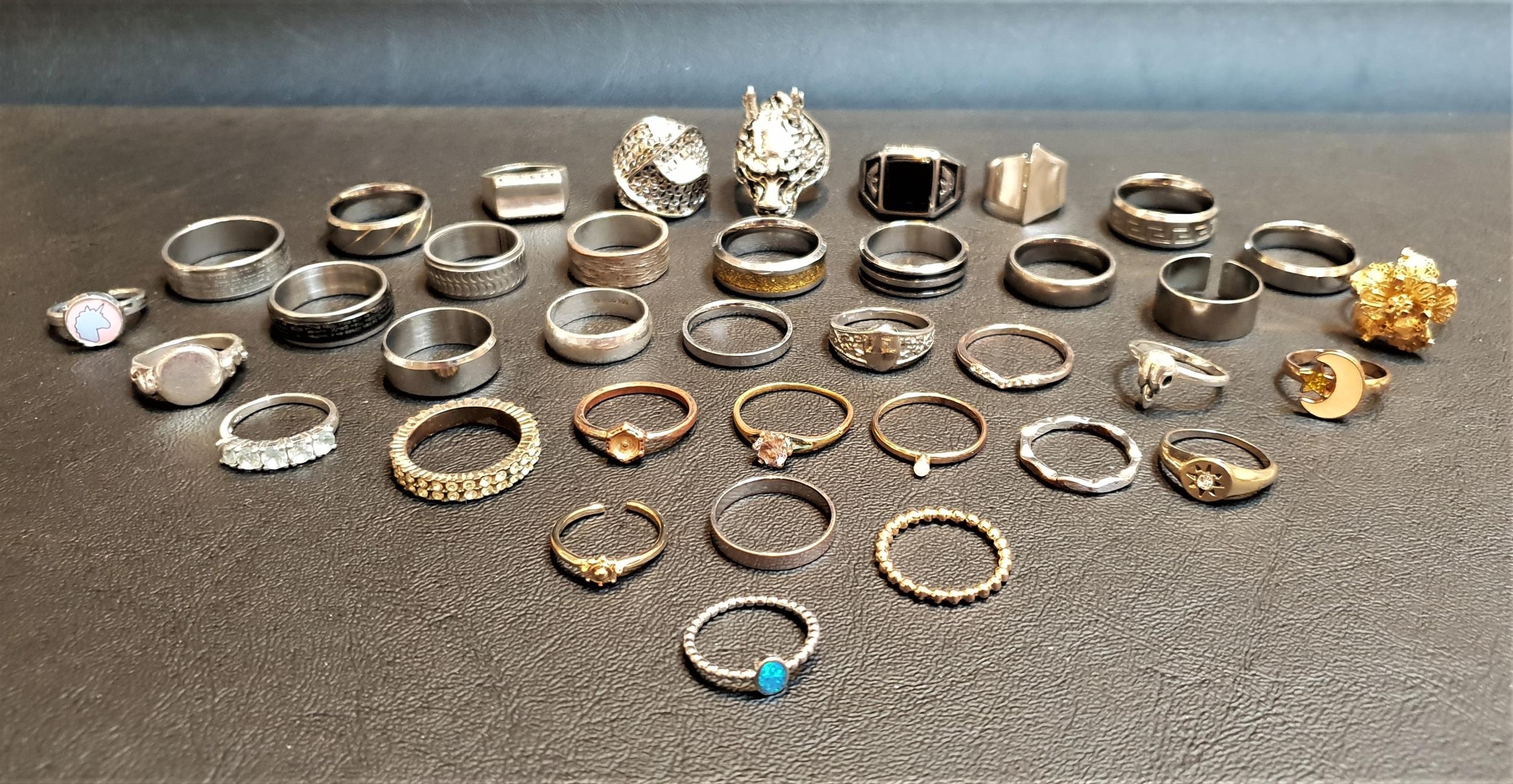 SELECTION OF SILVER AND OTHER RINGS of various sizes and designs, including stone set examples, 1