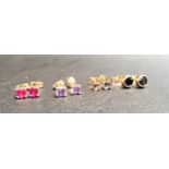 FOUR PAIRS OF GEM SET STUD EARRINGS all in nine carat gold, comprising mystic topaz, ruby,