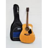 YAMAHA ACOUSTIC GUITAR model F310, with a soft shell case