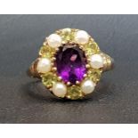 PRETTY 'SUFFRAGETTE' CLUSTER RING the central round cut amethyst approximately 1ct in peridot and