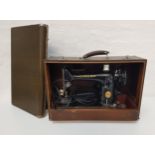 VINTAGE SINGER SEWING MACHINE in a fitted carry case with power lead and foot pedal, together with