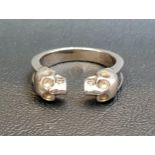 ALEXANDER McQUEEN RING with twin skull finial detail, ring size T