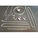SELECTION OF SILVER JEWELLERY comprising a CZ set necklace, two neck chains, a mother of pearl set