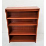 G PLAN TEAK BOOKCASE with a moulded top above three adjustable shelves, standing on a plinth base,