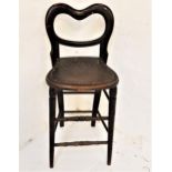 TALL BENTWOOD CHAIR with a shaped back above a pierced shaped seat, standing on turned supports