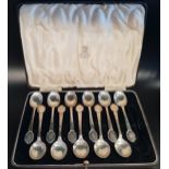 SET OF ELEVEN SILVER TEASPOONS Sheffield 1936, all with italic letter C to finial, (one lacking from