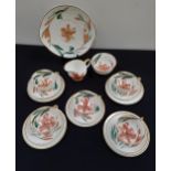 SUSIE COOPER TEA SERVICE decorated in the pink orchid pattern, comprising tea cups and saucers,