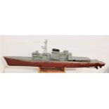 RADIO CONTROL NAVY FRIGATE of fibreglass construction with lift off deck and propellers, not