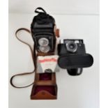 1950s JAPANESE YASHUIA FLEX CAMERA with a twin lens and cover, and original tan leather case with