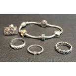 SELECTION OF FASHION JEWELLERY comprising a Chamilia silver charm bracelet with four charms by