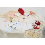 SELECTION OF CHILDREN'S AND BABIES CLOTHING including a child's smock with floral decoration, baby