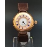 CONTINENTAL TWELVE CARAT GOLD HALF HUNTER WRISTWATCH the white enamel dial with Roman numerals and