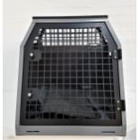 TRANS K9 VEHICLE DOG TRANSPORTER of metal construction with a non slip tray top and part pierced