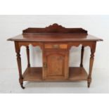EDWARDIAN WALNUT AND FIGURED WALNUT WASH STAND the shaped raised back above a moulded shaped top,