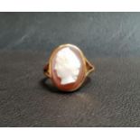HARD STONE CAMEO RING the cameo depicting a female bust in profile, on unmarked high carat gold