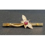 GARNET AND SEED PEARL DRAGONFLY DECORATED BROOCH the dragonfly set on a triple bar, in nine carat