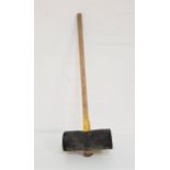 LARGE PAVING MALLET with a hickory shaft and rubber head, 107cm long