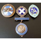 FOUR SILVER AND ENAMEL NURSE'S/ MIDWIFES BADGES comprising one for the Glasgow Royal Maternity