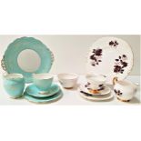 ROSLYN CHINA TEA SET with floral decoration on a turquoise ground, comprising six cups, saucers, and