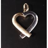 HEART SHAPED TWO TONE NINE CARAT GOLD GOLD PENDANT approximately 3.3cm high including suspension