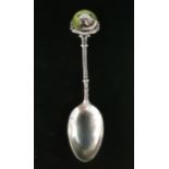 ENAMEL DECORATED SILVER TEASPOON the finial with bulldog decoration and a banner reading '