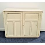PAINTED OAK SIDE CABINET with a moulded top above a pair of panelled cupboard doors opening to