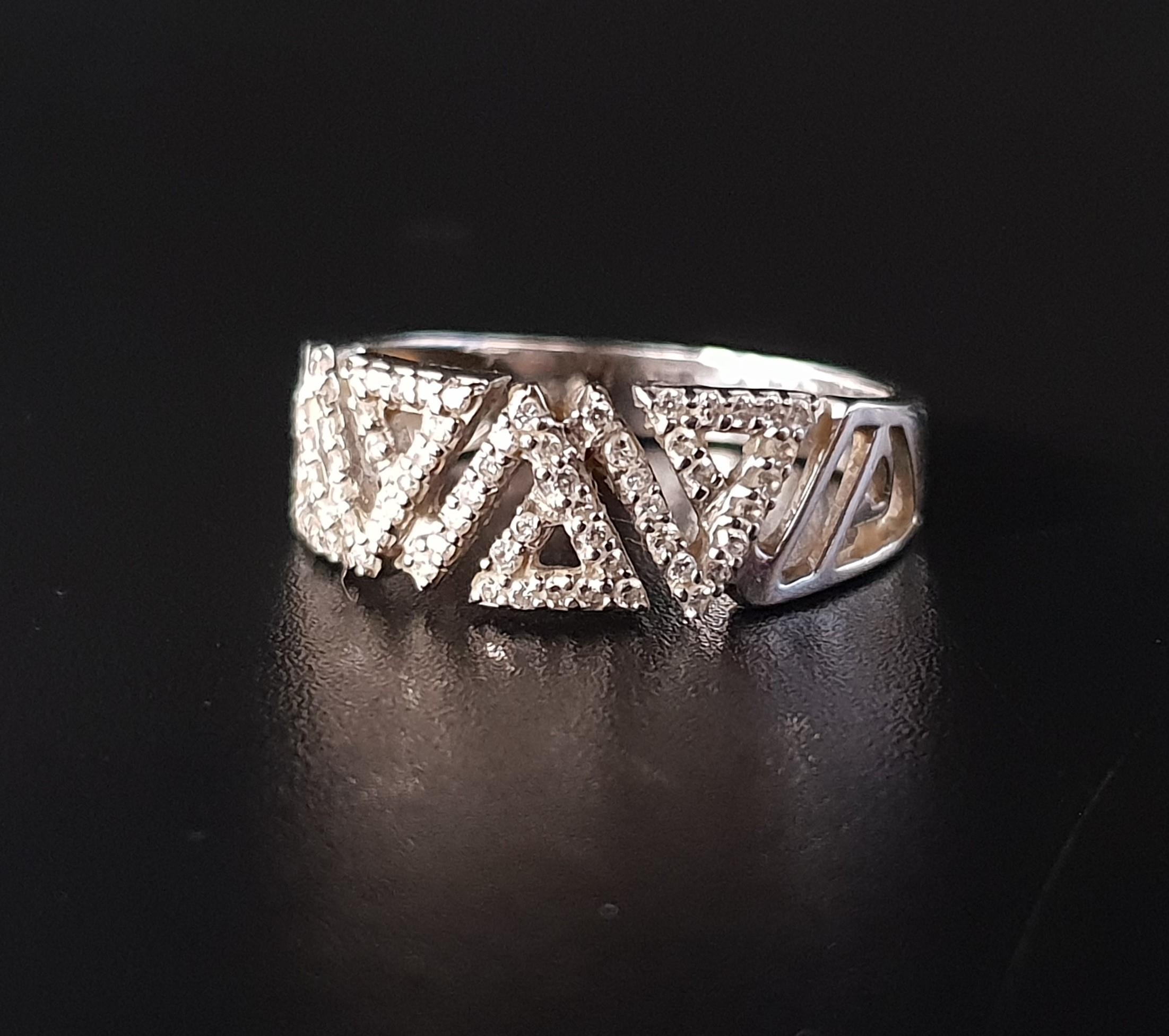 MULTI DIAMOND SET RING the diamonds in pierced geometric setting, in eighteen carat gold, ring
