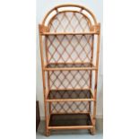 BAMBOO SHELF UNIT with an arched top and lattice work back, with four smoked glass shelves, 183cm